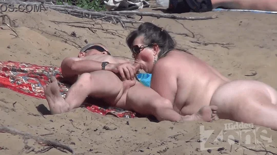 Blowjob on nudist beach