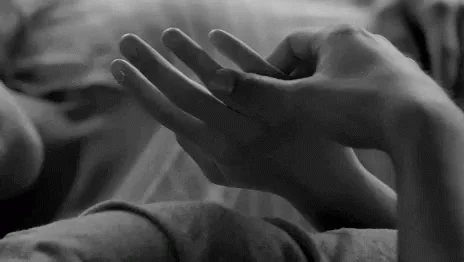 Couple cuddle hands
